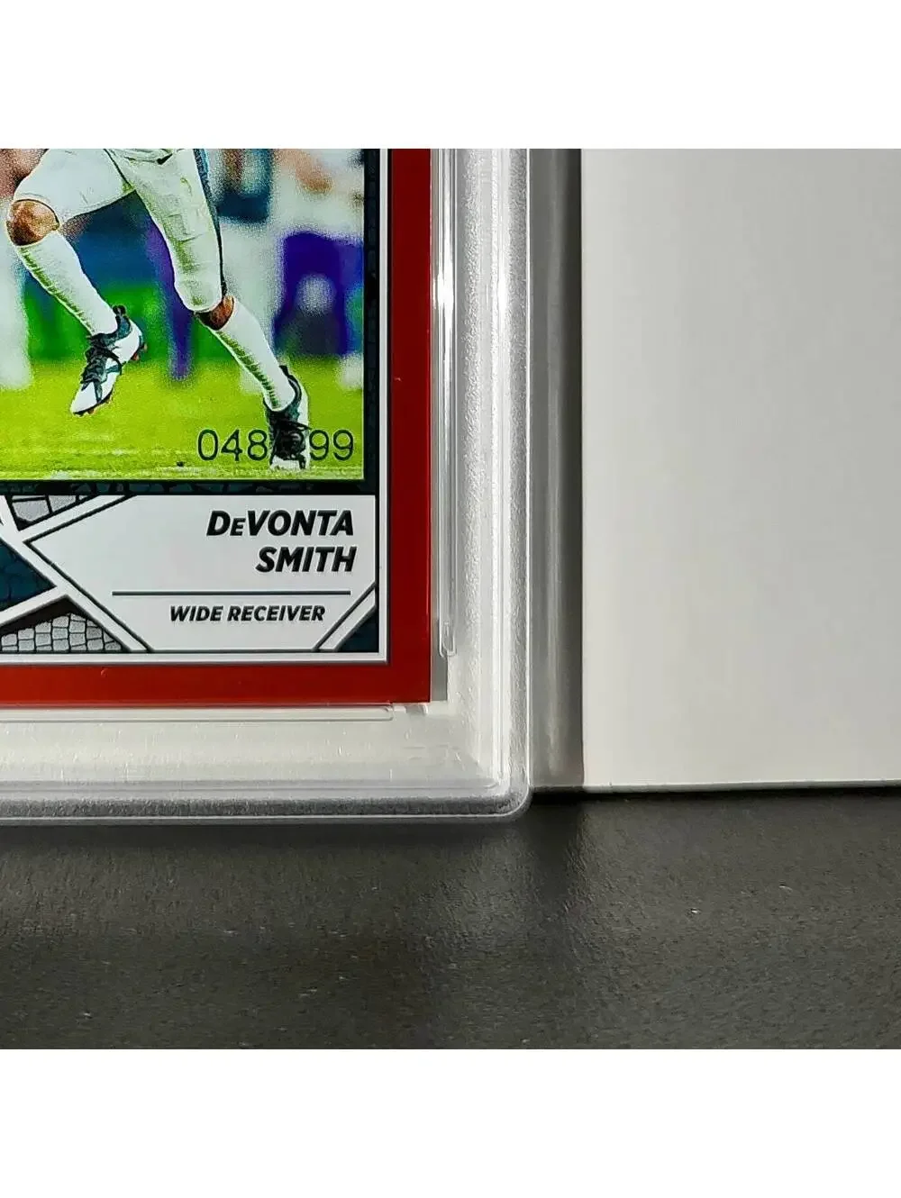 DeVonta Smith 2024 Panini Sticker Collection 048/299 #44 Red Foil PSA 9 Mint